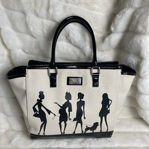 Lulu Guinness bag.  Black patent leather. & off white canvas.